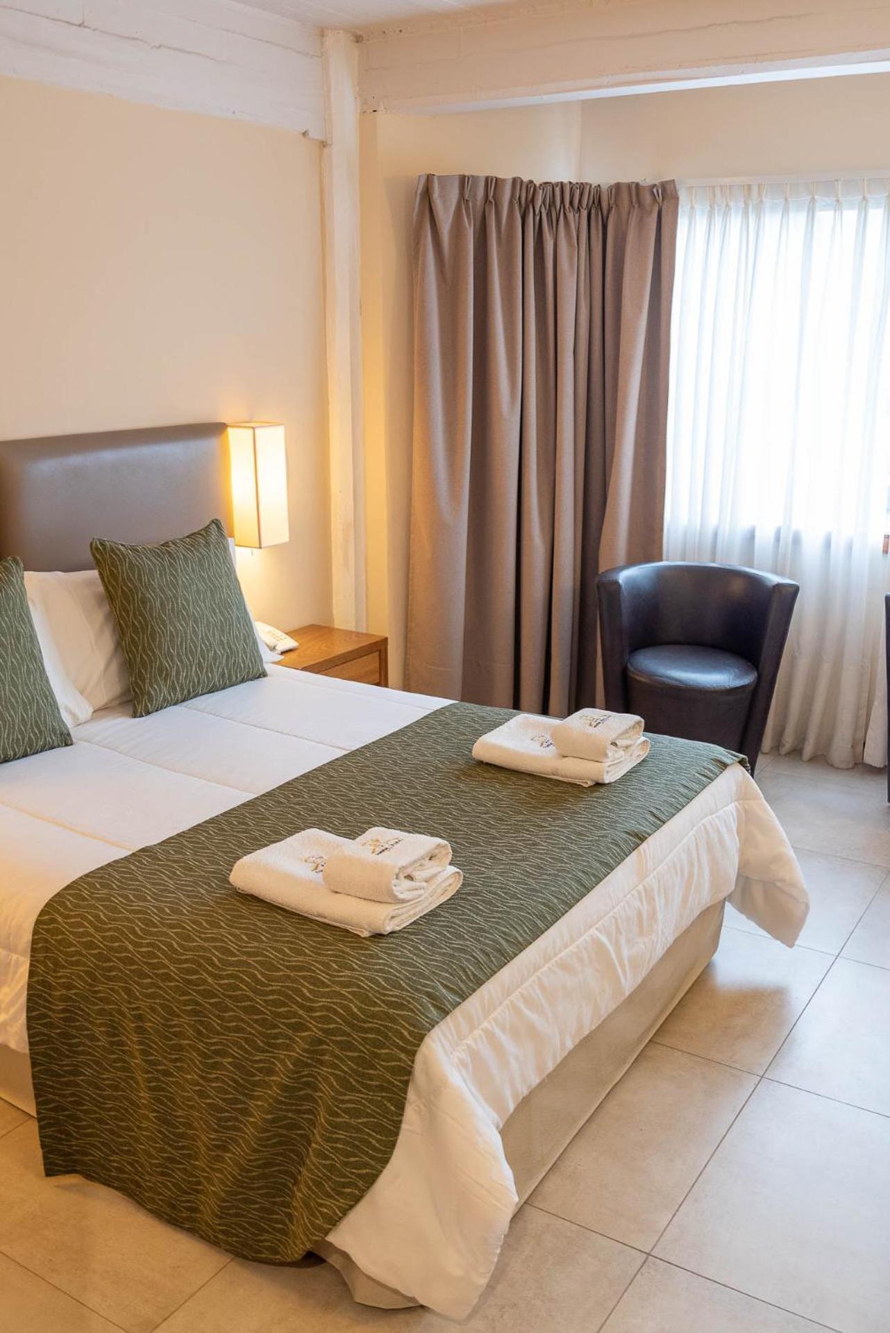 Fonte Arcada Hotel Villa Gesell Ruang foto